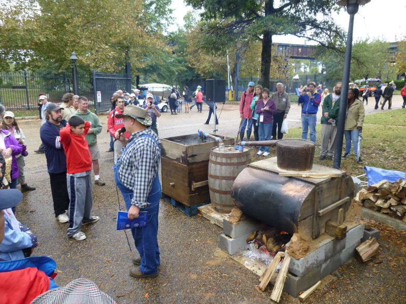 demonstration of moonshine making at Richmond Folk Festival, 2013