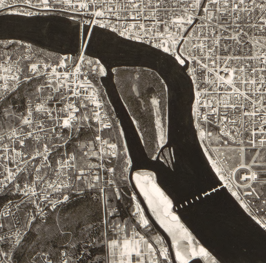 the gap between Columbia Island and Analostan Island was increased to allow Potomac River floodwaters to pass downstream