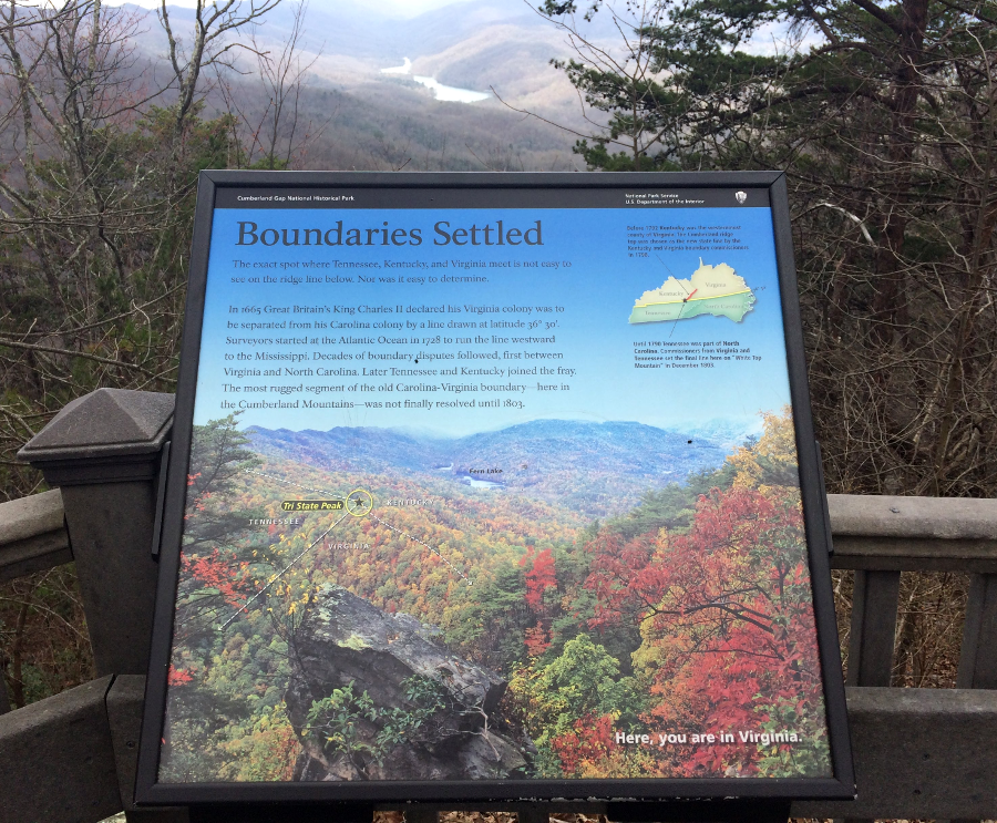 a National Park Service sign notes that the boundaries of Virginia, Tennessee, and Kentucky meet at Cumberland Gap