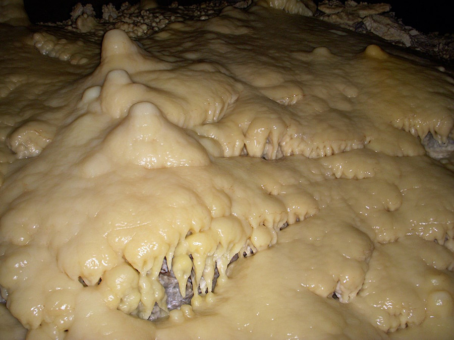 evaporation from slowly-flowing water creates the speleothem called flowstone