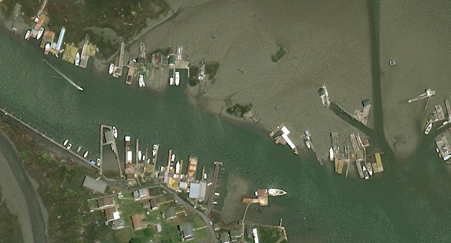 crab shacks line the waterway opposite the Tangier Island dock