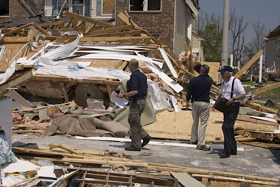 Federal and state officials assessed damage from a 2008 tornado in Suffolk