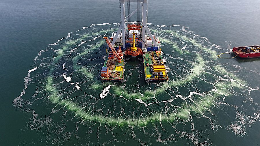 bubbles block the sound of driving piles into the seafloor from disturbing marine life, including migrating right whales