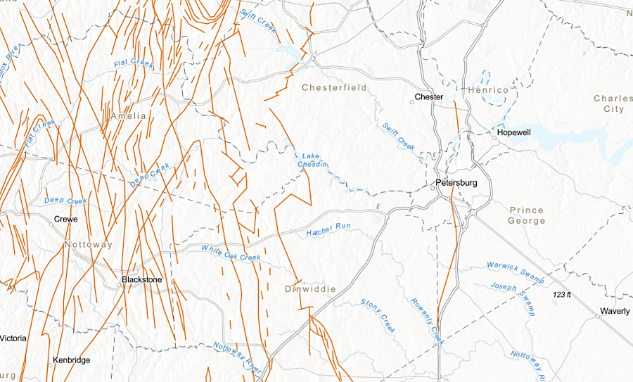 mapped faults (brown lines) are common west of the Fall Line in the Piedmont, but relatively rare in the Coastal Plain