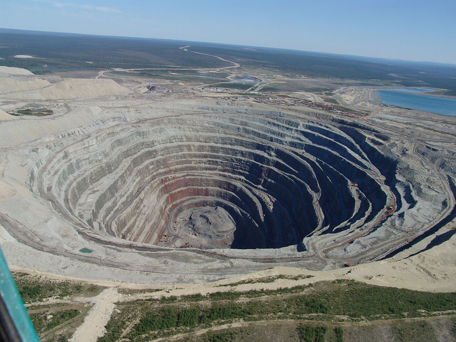 in Siberia, massive amounts of rock are extracted from the mine at the Udachnaya pipe to find a few diamond crystals