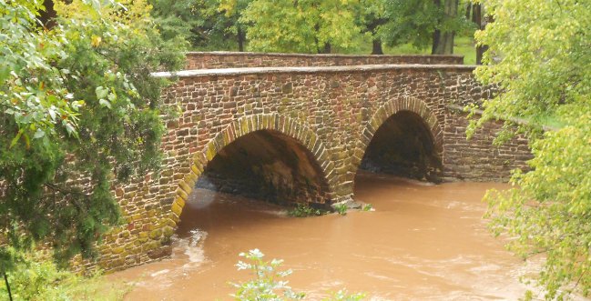 excessive sediment load in Bull Run, flowing past Stone Bridge at Manassas Battlefield National Park, on the way to the Chesapeake Bay