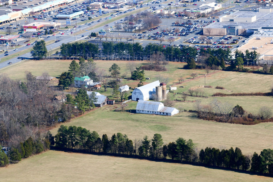 private property owners choose if, as well as when, to develop their land - as demonstrated by the farm next to Manassas Mall