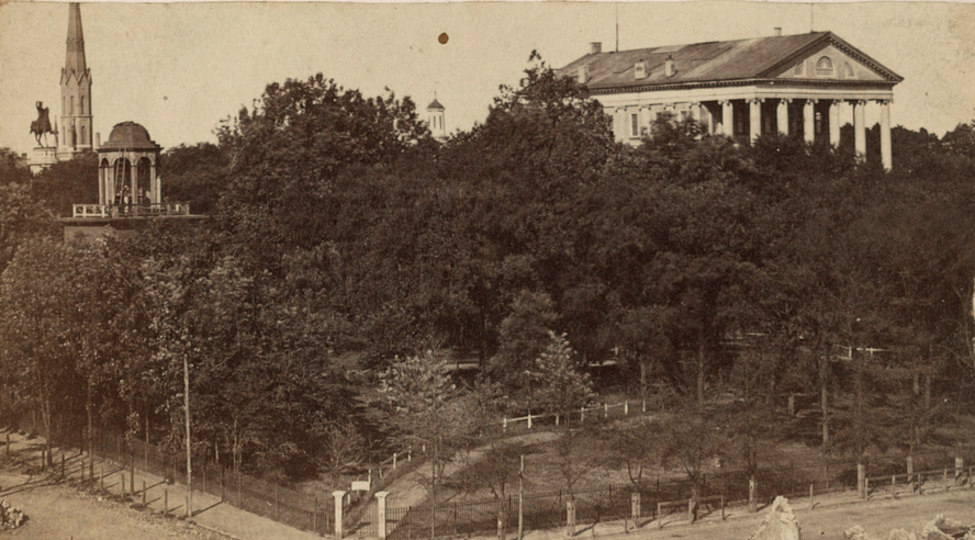 Capitol Square (looking northwest from the corner at 9th and Bank Street) provided a buffer of green space that protected the capitol building from destruction in the 1865 Evacuation Fire