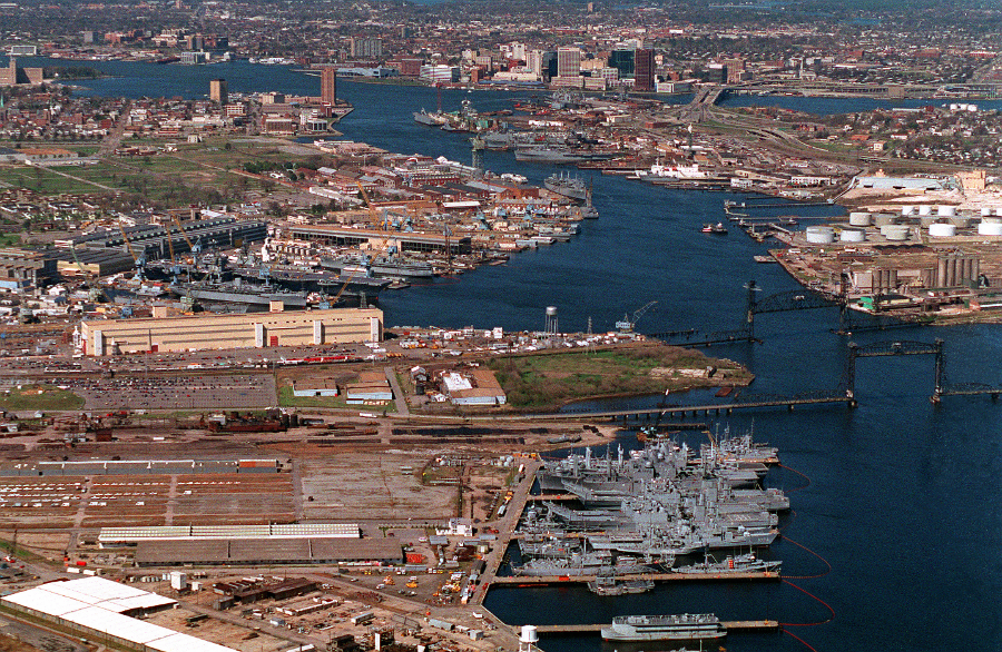 looking north in 1995 along the Southern Branch of the Elizabeth River (Norfolk Naval Shipyard on left, downtown Norfolk in distance)