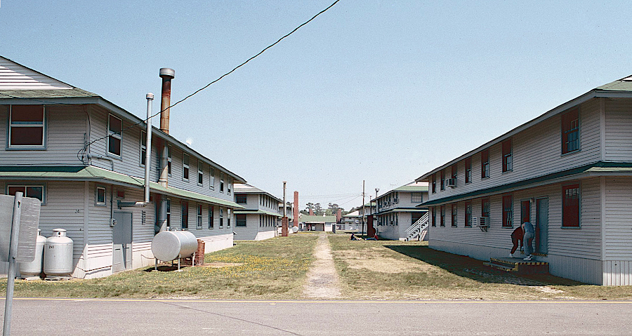 the two-story frame barracks built during World War II, with eyebrow canaopies, were still in use at Camp Pendleton in 1990