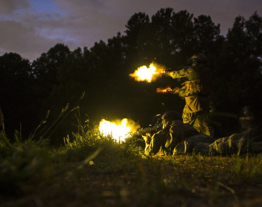 military units practice live fire operations at Fort Pickett, day and night