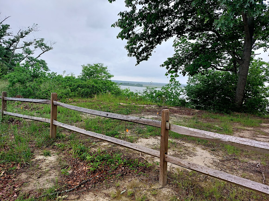 the cliffs above Carters Wharf are not stable, so the US Fish and Wildlife Service has built a fence to keep visitors away from the crumbling edge
