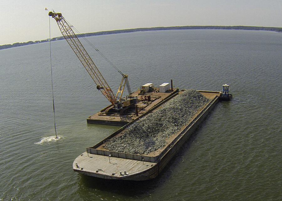 granite rock, brought in by barge, was methodically placed in the Piankatank River near Gwynn's Island in Mathews County