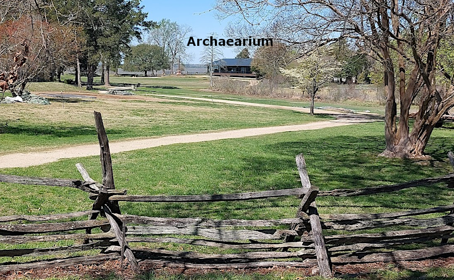 paths through the field in front of the Archaearium are blocked by intermittent flooding