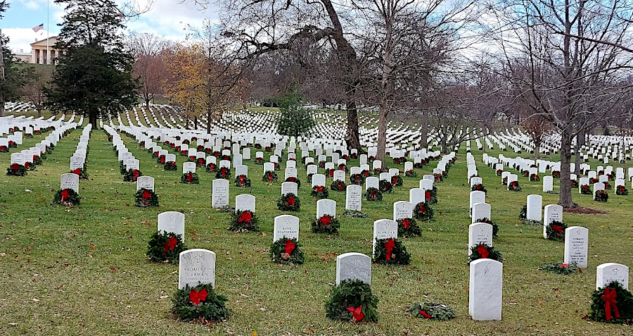 wreaths downhill from the mansion house at Arlington National Cemetery on December 18, 2023
