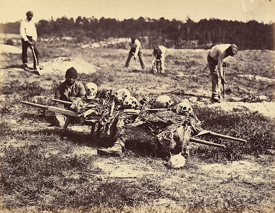 the remains of soldiers killed at Cold Harbor in 1864 were excavated and reburied in 1866