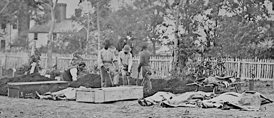 black men burying white Confederate soldiers during the Civil War