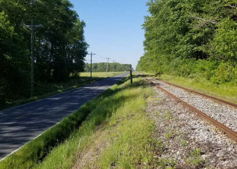 the Bay Coast Railroad track ran parallel to Route 13