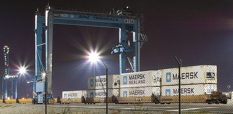 containers at A.P. Moller Terminal (APM) - now Virginia International Gateway (VIG) - are loaded by gantries from a ship onto a chassis, and that chassis is then moved to a portion of the yard where another gantry loads the container onto a truck