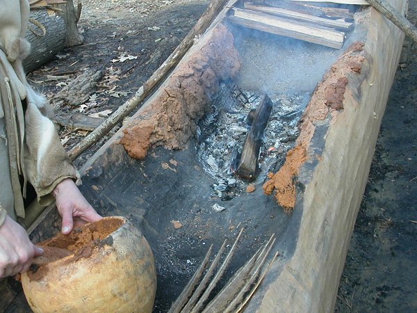 hand-carved canoe at Jamestown, made by burning the wood in the center and scraping the charred wood with bone and stone tools