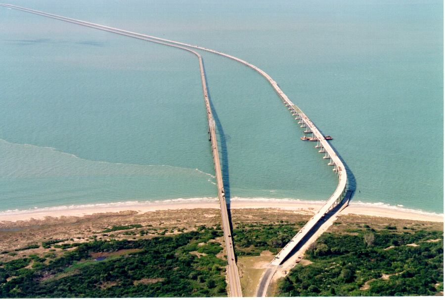 high bridges over the North Channel of the Chesapeake Bay Bridge-Tunnel allow boats to travel underneath the spans without going south to the Chesapeake Channel