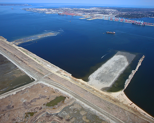 two dikes on eastern side of Craney Island will be connected by a third perpendicular dike to create a 200-acre cell, to be filled with dredge spoils and then developed as a new terminal by 2028