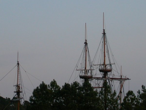 view from the river of replicas of the first English ships at Jamestown (Susan Constant, Godspeed, and Discovery)
