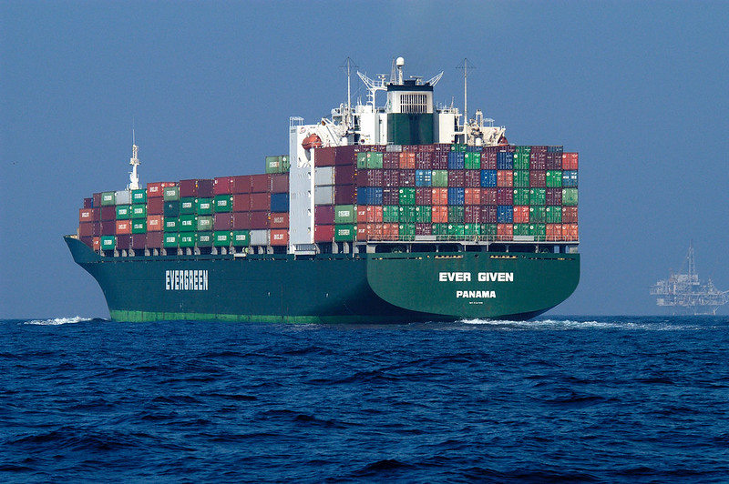 container ships stop at a scheduled sequence of ports, loading/offloading only a percentage of their containers during each stop