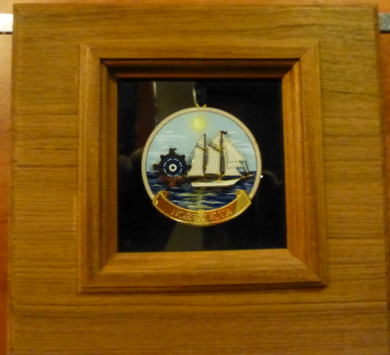 the Norwegian Cruise Line ship <em>Dawn</em> displays plaques recognizing when it first visited a port, including Norfolk