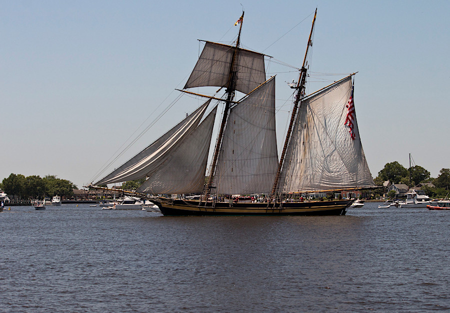 the parade of tall ships on the Elizabeth River during Norfolk's Harborfest is a reminder of the days of sailing ships