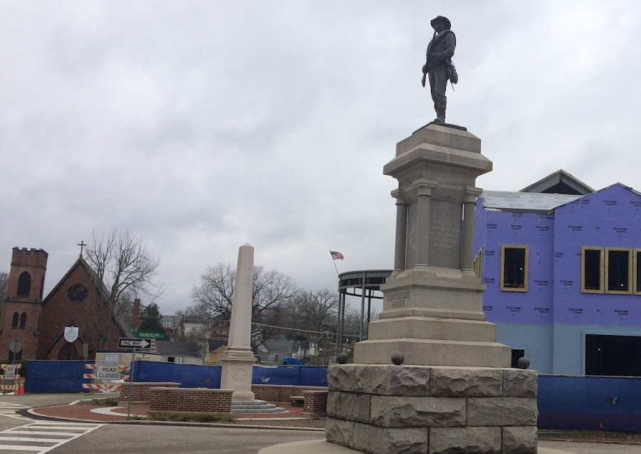 a monument acknowledging the school closings has been erected next to the statue honoring Confederate Heroes