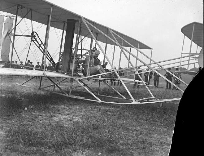 Orville Wright in the Wright Military Flyer at Fort Myer in 1908 with Lt. Thomas Selfridge (closest to camera), taking off just before Selfridge was killed
