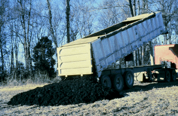 biosolids application starts with hauling the nutrients to a site, then spreading them