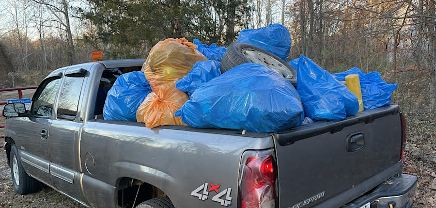 a bandalong traps litter near the mouth of Neabsco Creek in Prince Wiliam County that volunteers then haul away (photos courtesy of Neil Nelson)