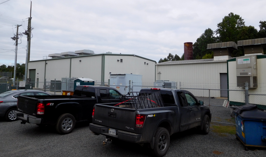 the generators burning methane to produce electricity at the Prince William County landfill are housed in a simple industrial building 
