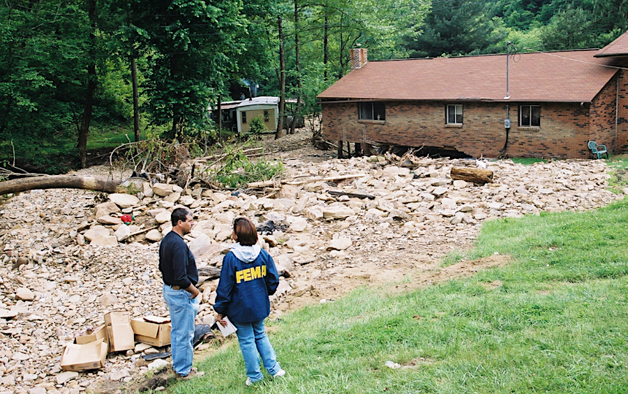 flooding in Appalachia washes away building foundations and moves trailer homes