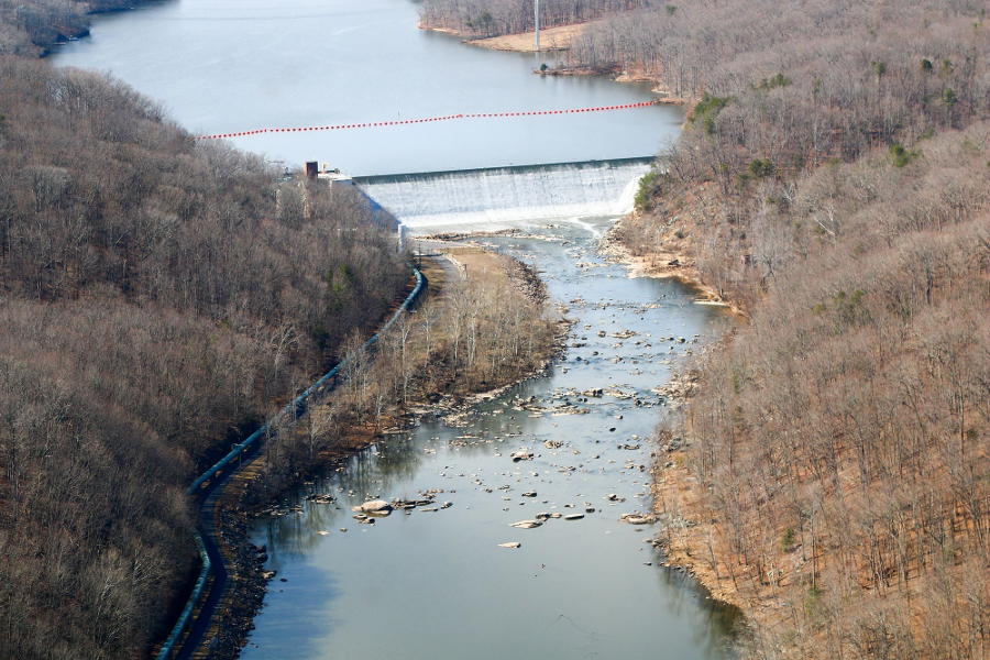 the 70' high dam was built by Alexandria Water in 1957 to enlarge its drinking water reservoir on the Occoquan River