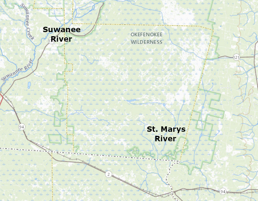 the Okefenokee Swamp is on the watershed divide, with the St. Marys River flowing east to the Atlantic Ocean and the Suwannee River flowing south to the Gulf of Mexico