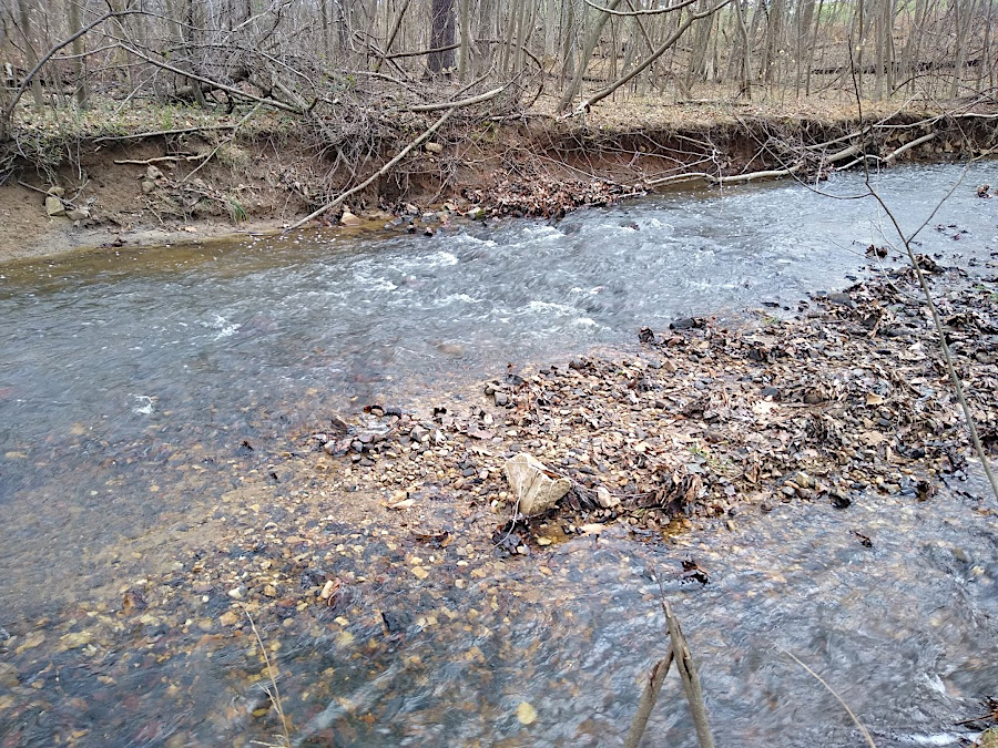 a clear bed and bank, and a pool-and-riffle pattern, are indicators of a perennial stream channel